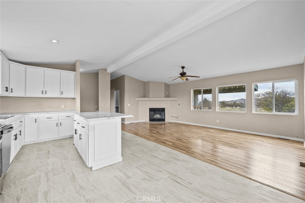 6142 Rare Rabbit Avenue Mojave, CA 93501 - Photo 20 of 50 a view of kitchen with furniture wooden floor and window