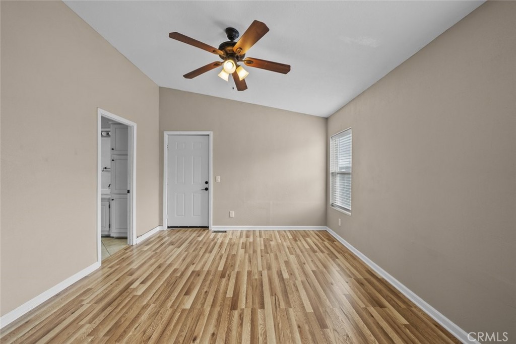 6142 Rare Rabbit Avenue Mojave, CA 93501 - Photo 34 of 50 wooden floor in an empty room with a window