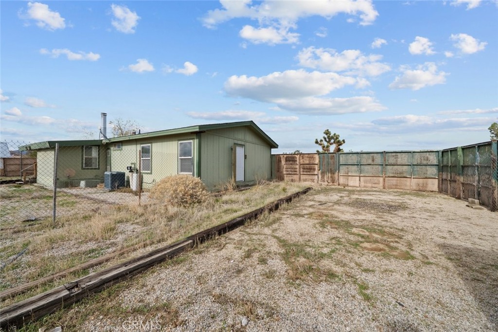 6142 Rare Rabbit Avenue Mojave, CA 93501 - Photo 41 of 50 a view of a house with backyard