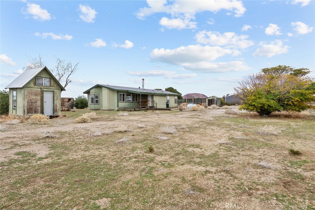 6142 Rare Rabbit Avenue Mojave, CA 93501 - Photo 42 of 50 a house view with a outdoor space