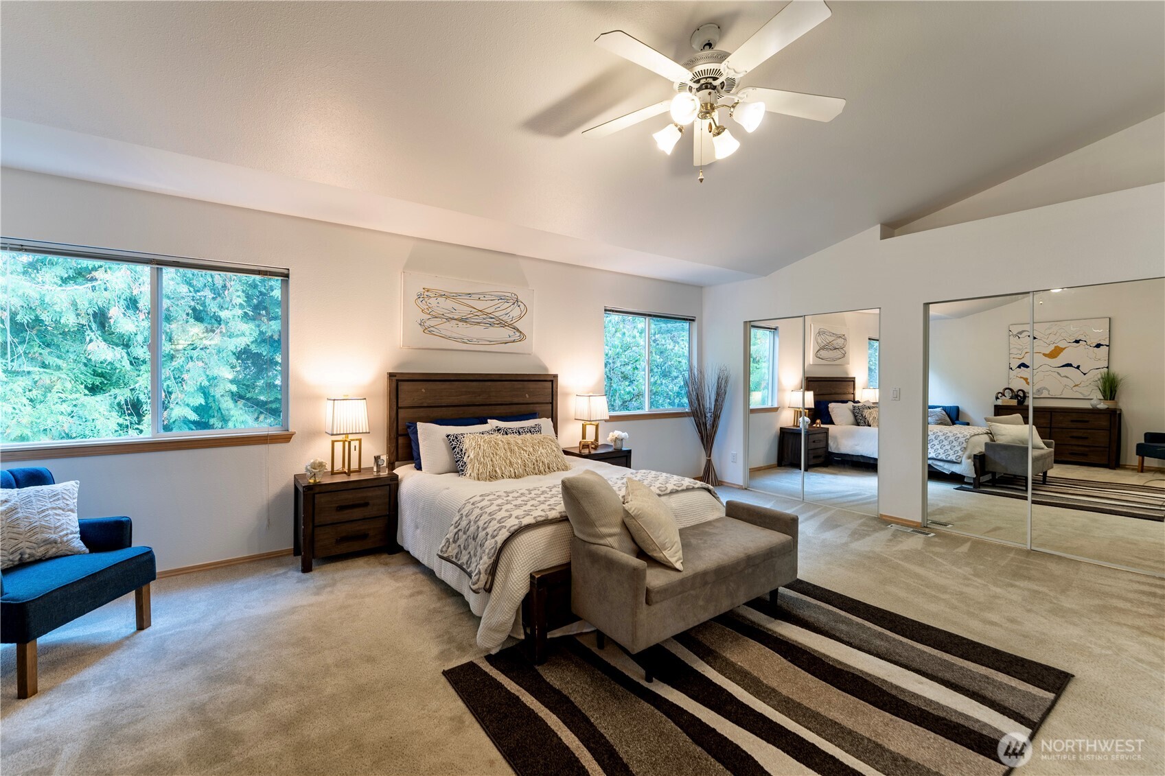 18809 20th Drive Southeast Bothell, WA 98012 - Photo 14 of 27 a bedroom with a large bed couch and windows