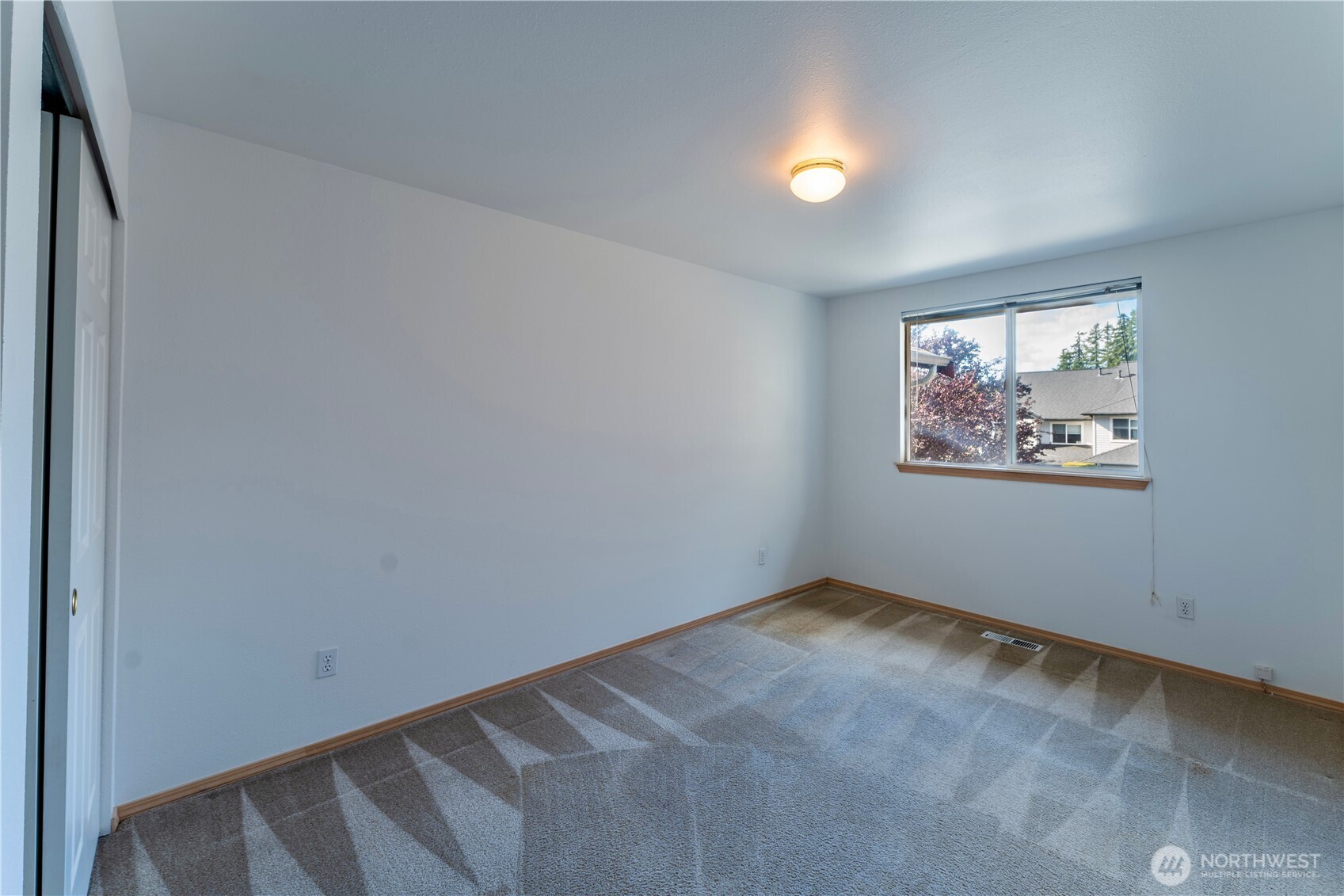 18809 20th Drive Southeast Bothell, WA 98012 - Photo 17 of 27 an empty room with windows and window