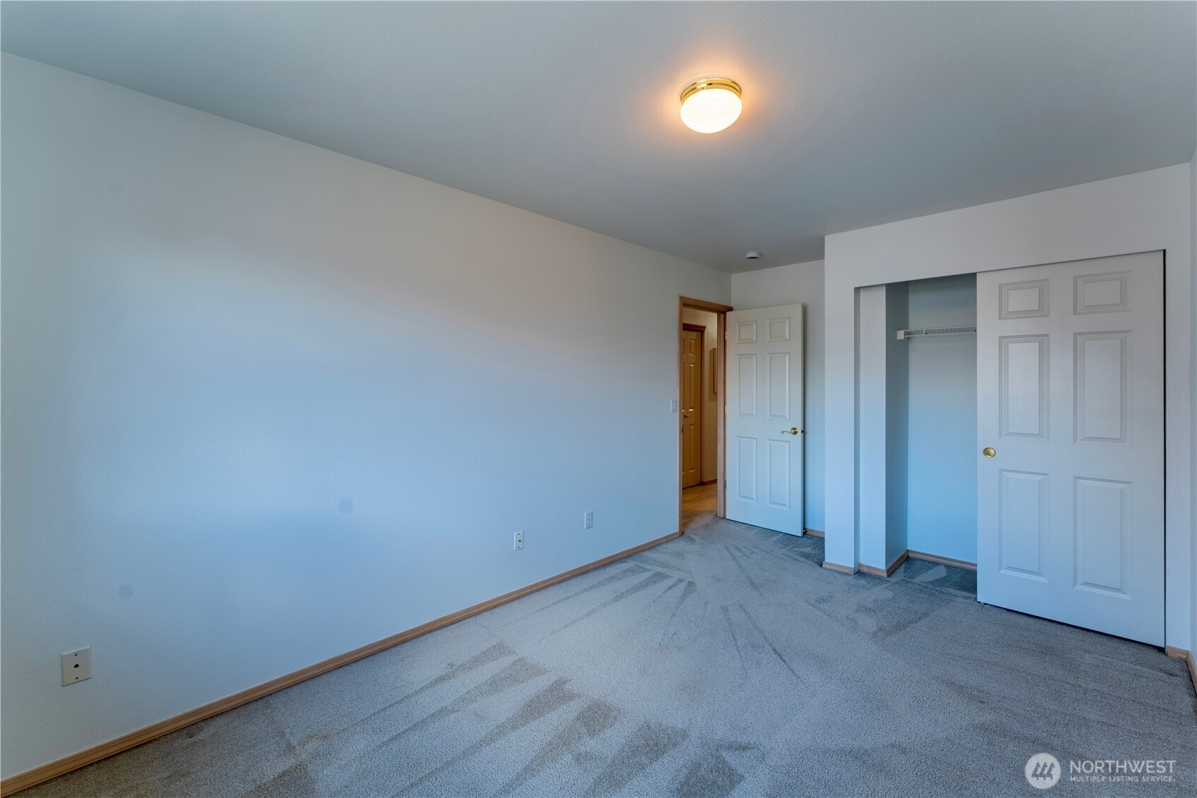18809 20th Drive Southeast Bothell, WA 98012 - Photo 18 of 27 an empty room with closet area