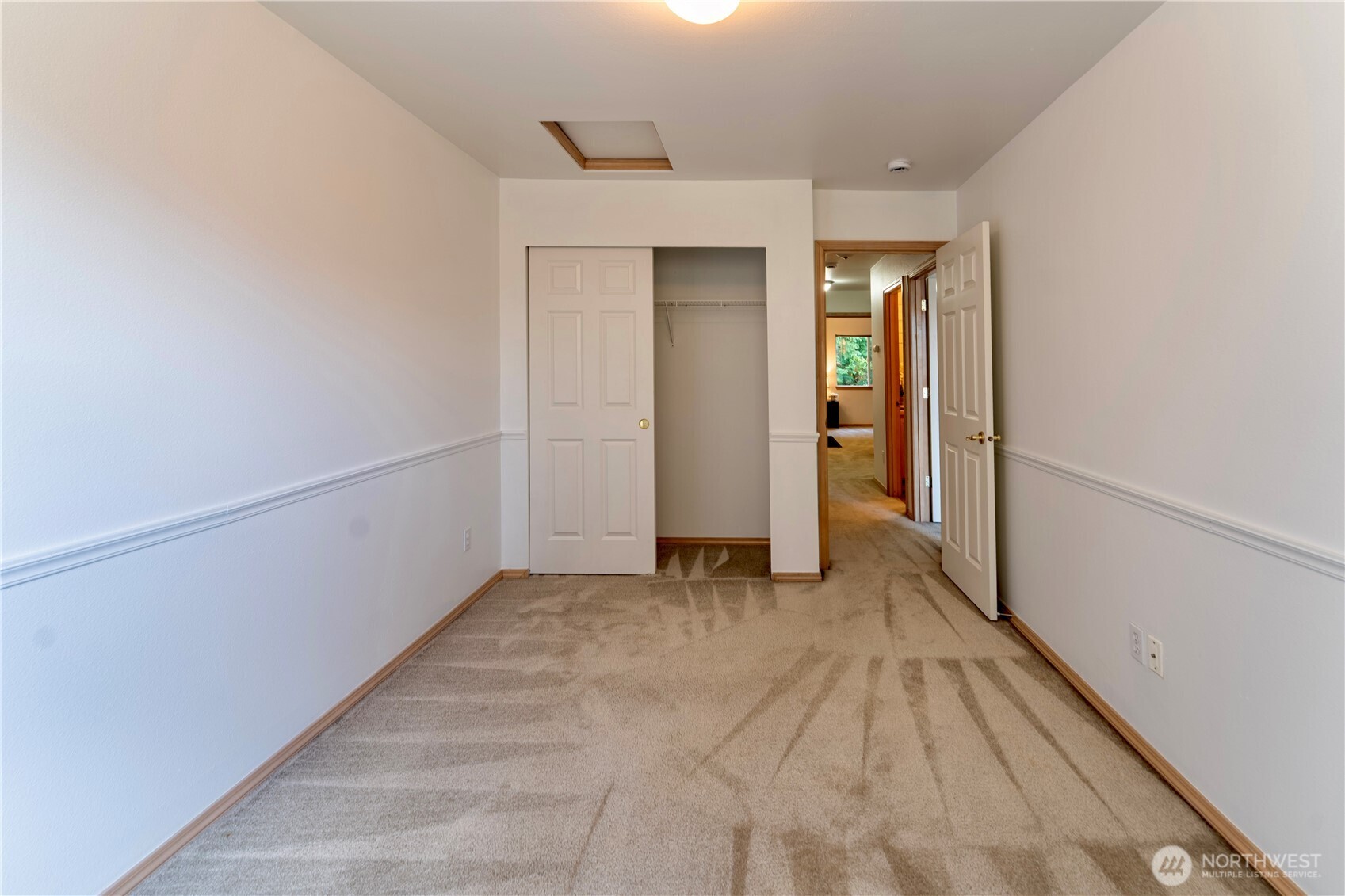 18809 20th Drive Southeast Bothell, WA 98012 - Photo 23 of 27 a view of a hallway with wooden floor