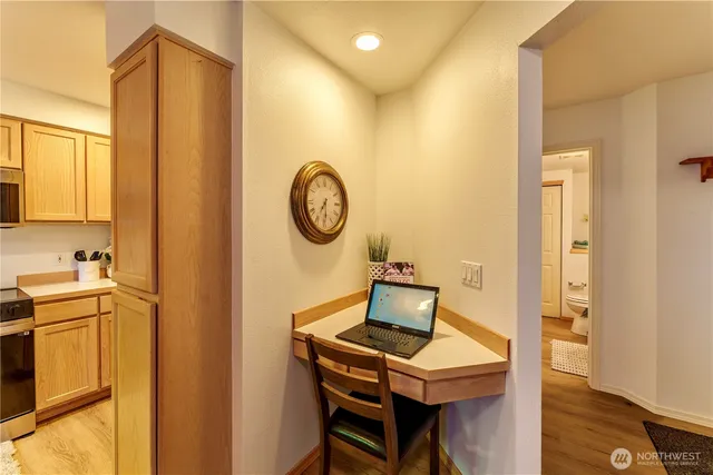 a view of a bathroom with sink and mirror