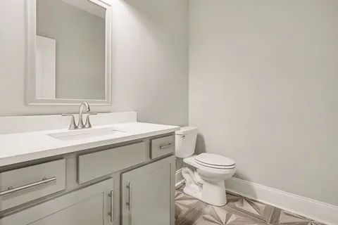 a bathroom with a sink and a toilet