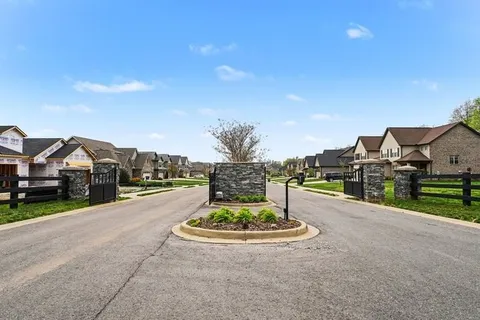 a view of a street with a houses