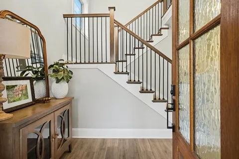 a view of entryway with wooden floor