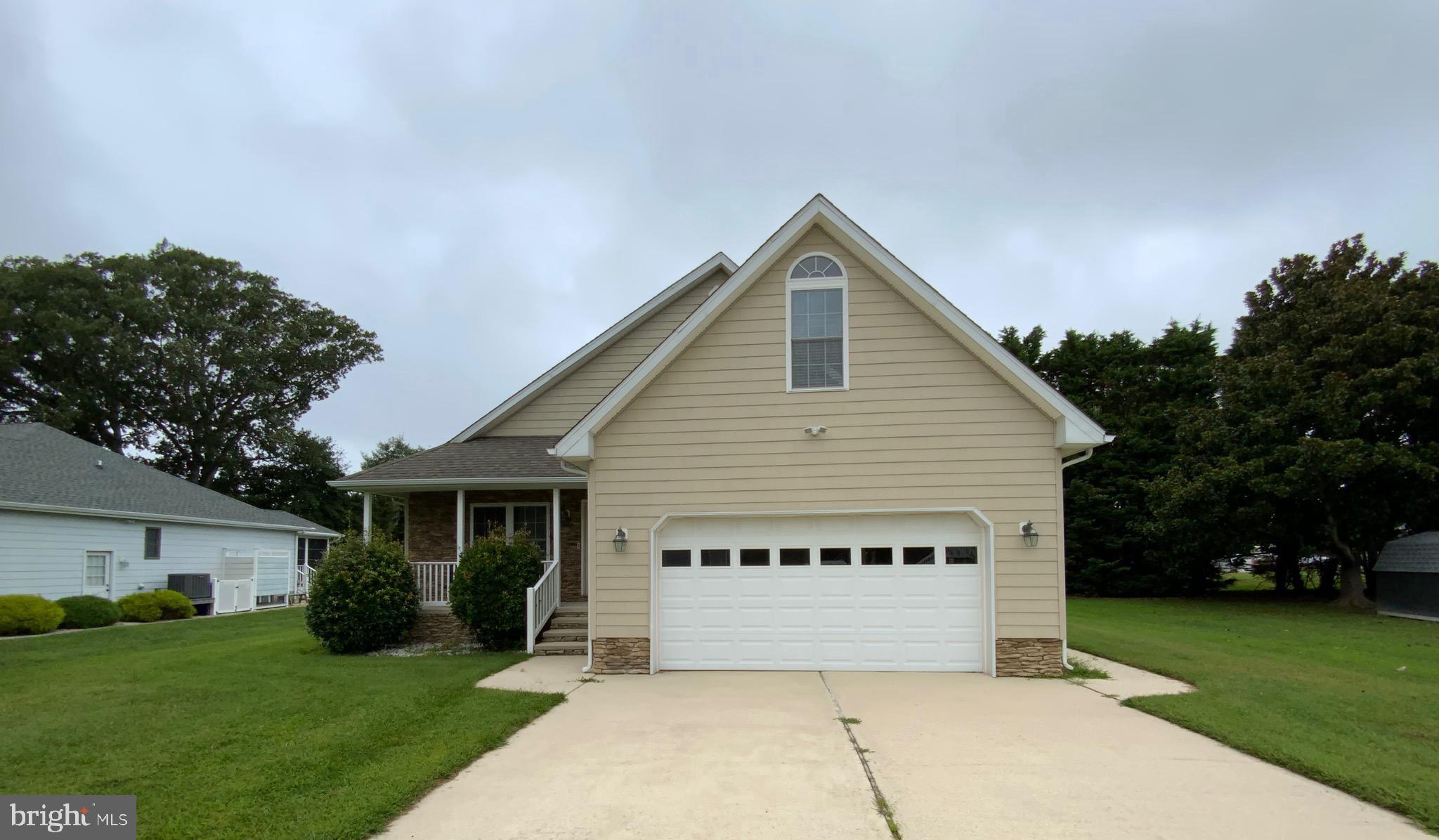 38211 Marlington Road Ocean View, DE 19970 - Photo 1 of 56 a view of a house with a yard