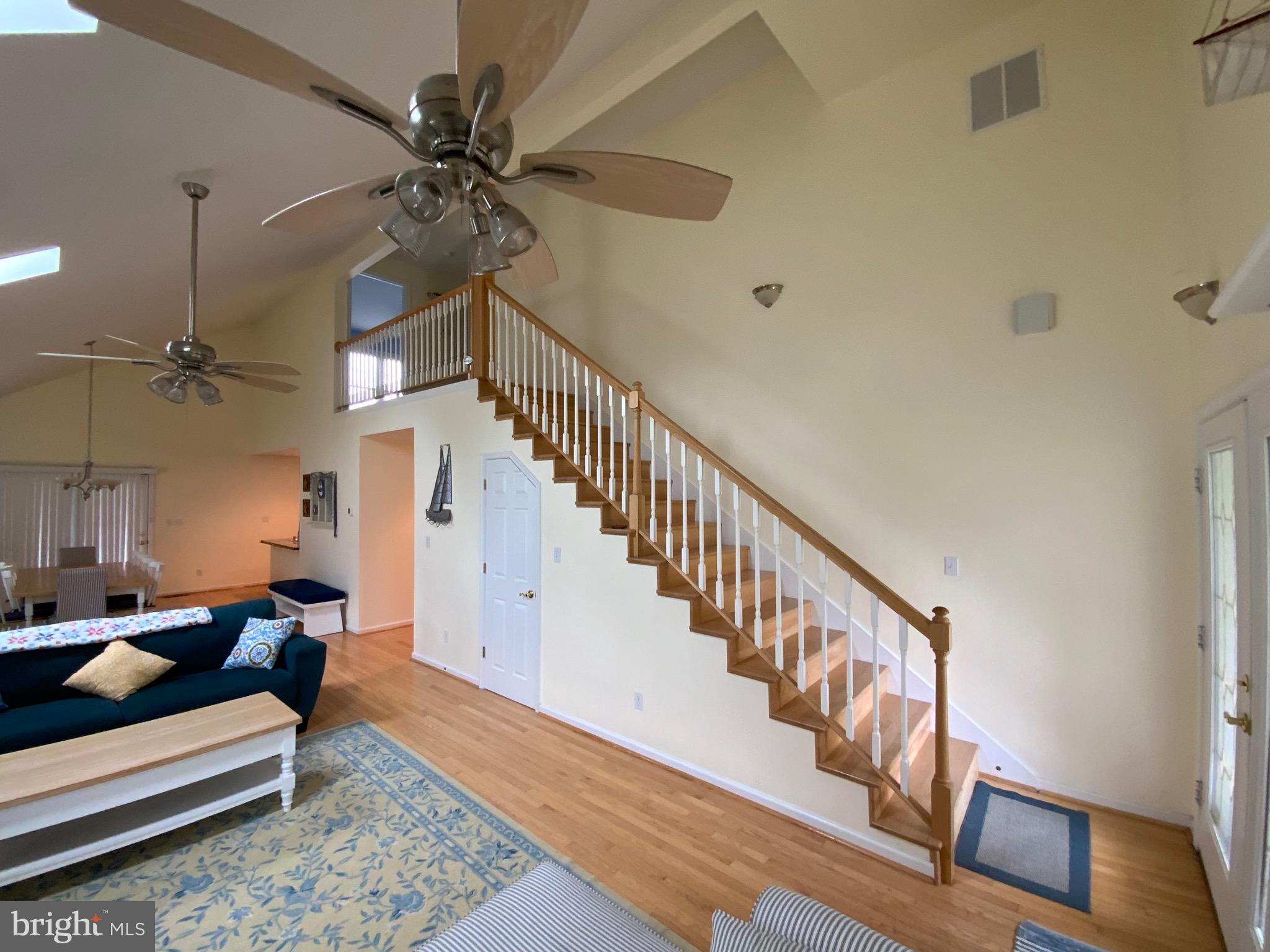 38211 Marlington Road Ocean View, DE 19970 - Photo 17 of 56 a view of entryway and hall with wooden floor