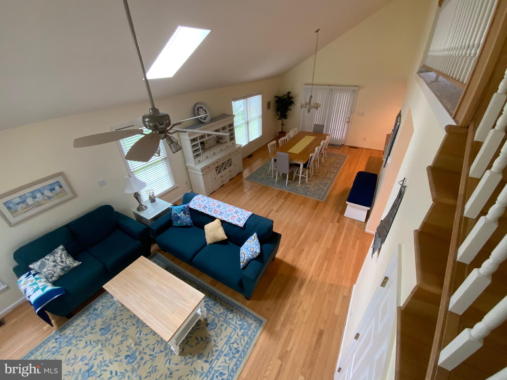38211 Marlington Road Ocean View, DE 19970 - Photo 18 of 56 a living room with furniture and a rug