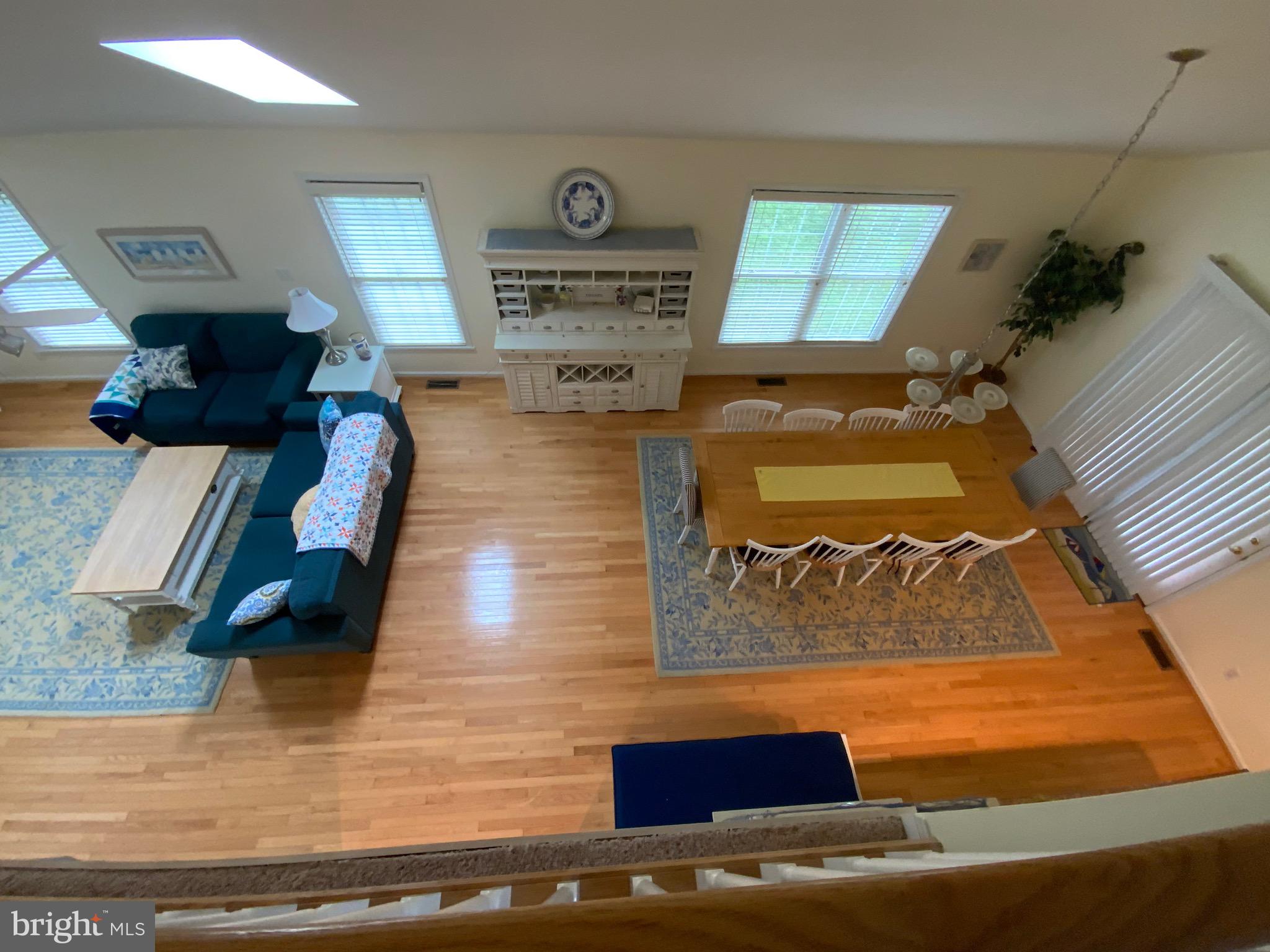38211 Marlington Road Ocean View, DE 19970 - Photo 22 of 56 a living room with furniture and a rug