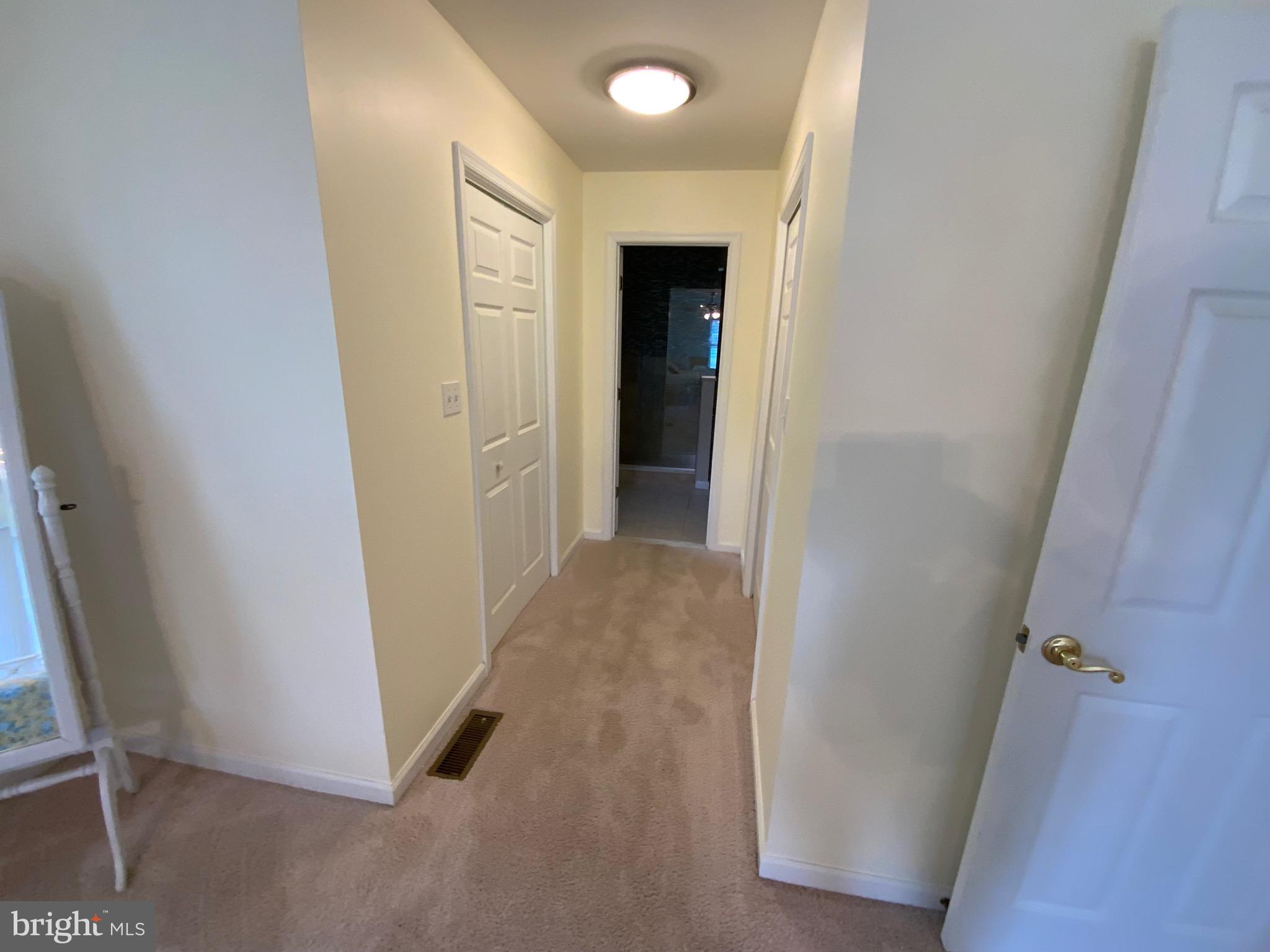 38211 Marlington Road Ocean View, DE 19970 - Photo 26 of 56 an entryway door with a hallway in the house