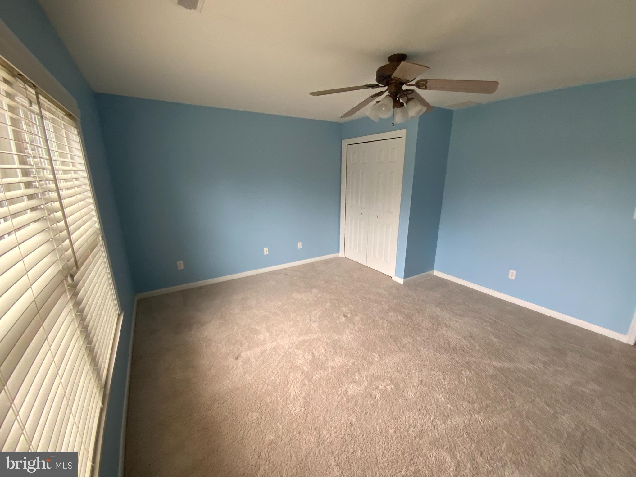 38211 Marlington Road Ocean View, DE 19970 - Photo 30 of 56 a view of a livingroom with a ceiling fan and window