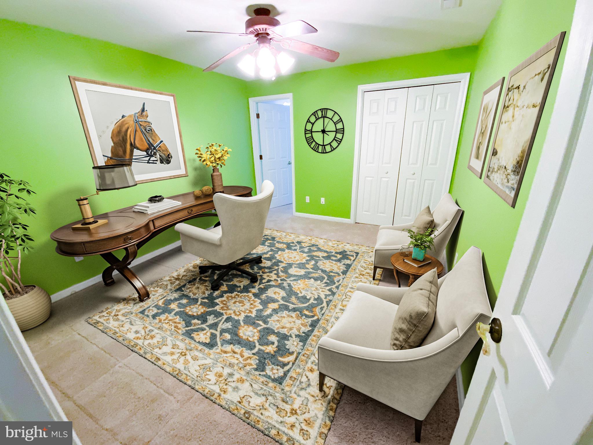 38211 Marlington Road Ocean View, DE 19970 - Photo 38 of 56 a living room with furniture and a wooden floor