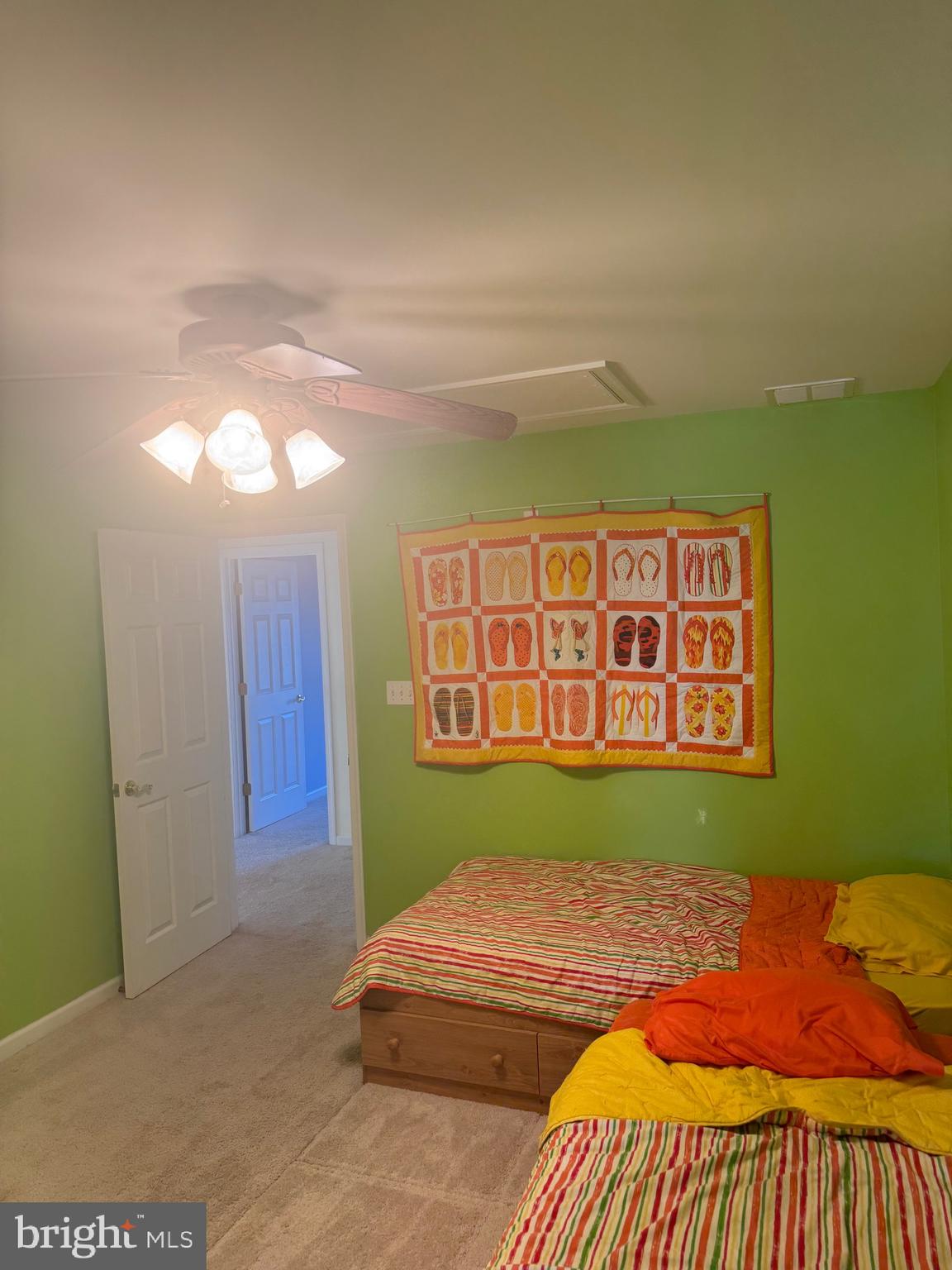 38211 Marlington Road Ocean View, DE 19970 - Photo 39 of 56 a bedroom with a bed and a window