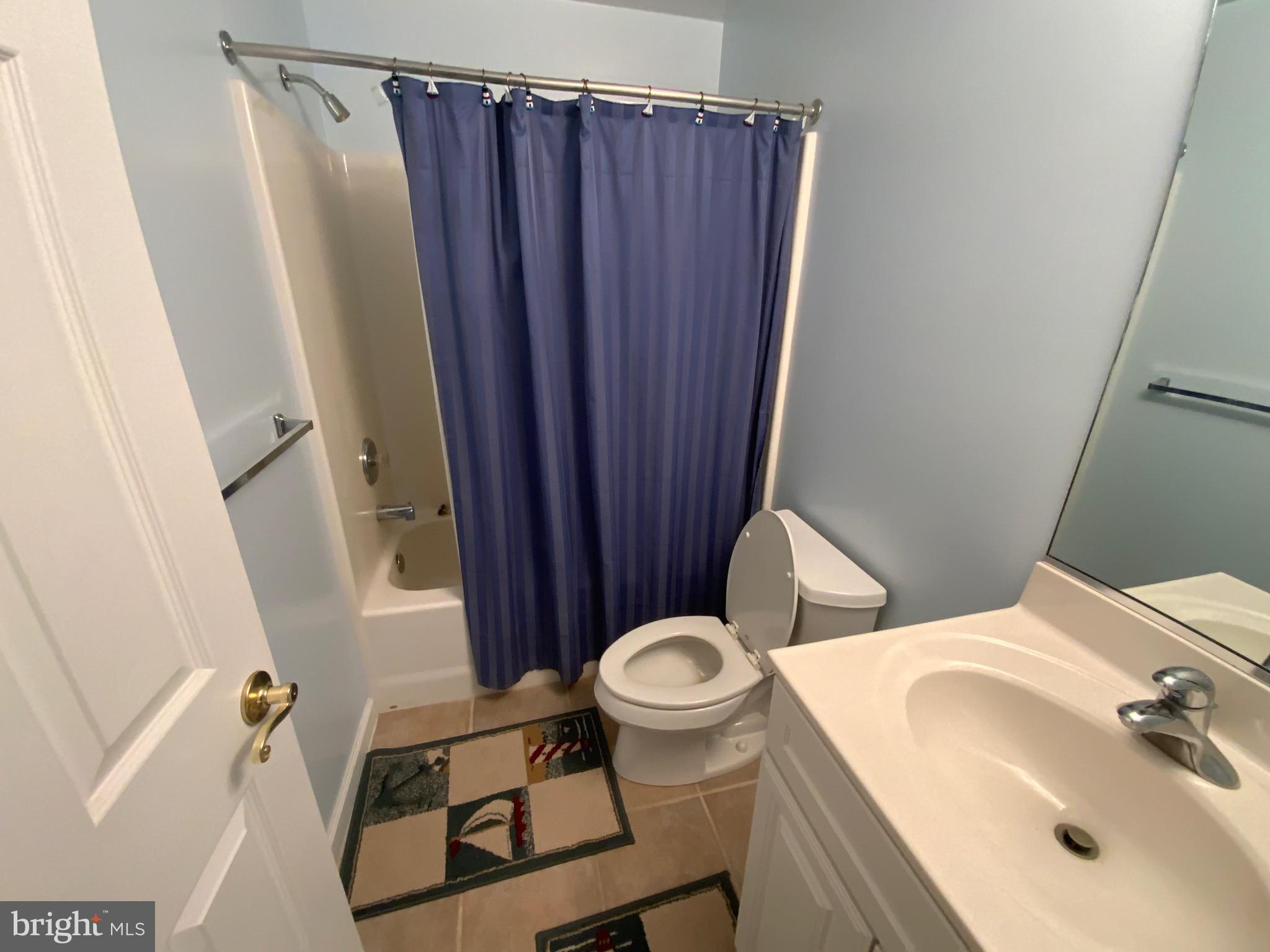 38211 Marlington Road Ocean View, DE 19970 - Photo 40 of 56 a bathroom with a sink and a toilet
