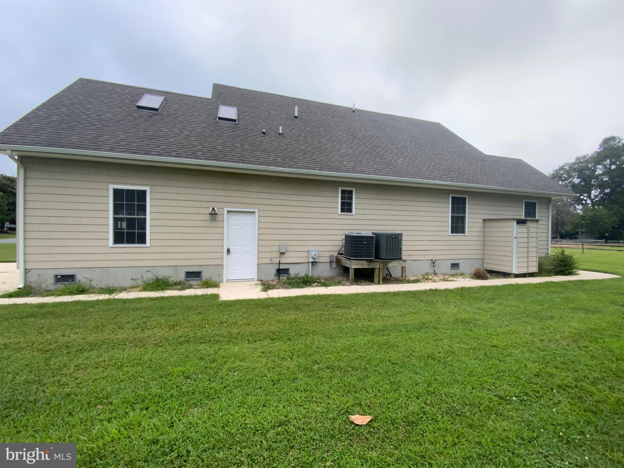 38211 Marlington Road Ocean View, DE 19970 - Photo 4 of 56 a front view of house with yard