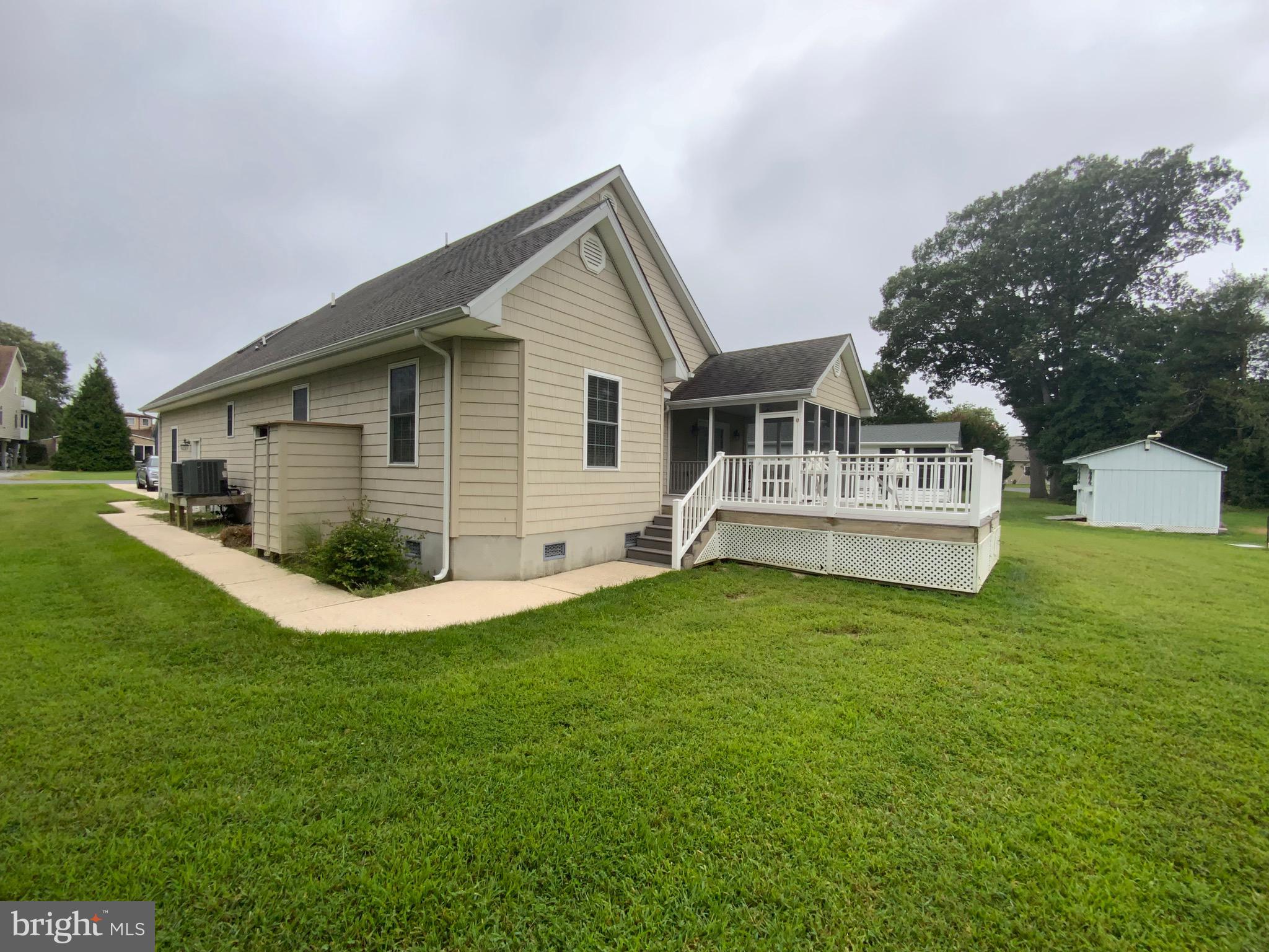 38211 Marlington Road Ocean View, DE 19970 - Photo 5 of 56 a view of a house with a yard