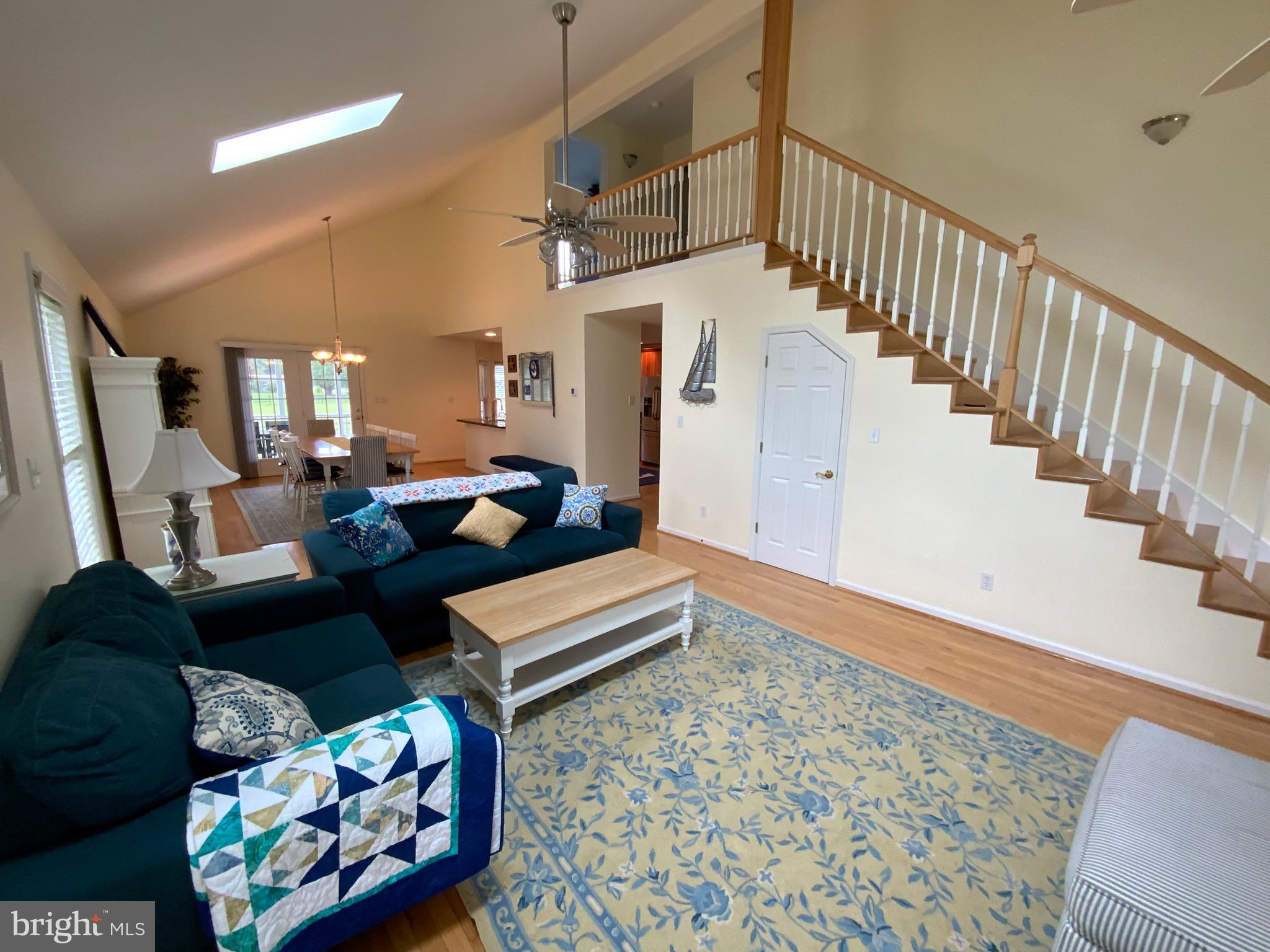 38211 Marlington Road Ocean View, DE 19970 - Photo 9 of 56 a living room with furniture and a rug