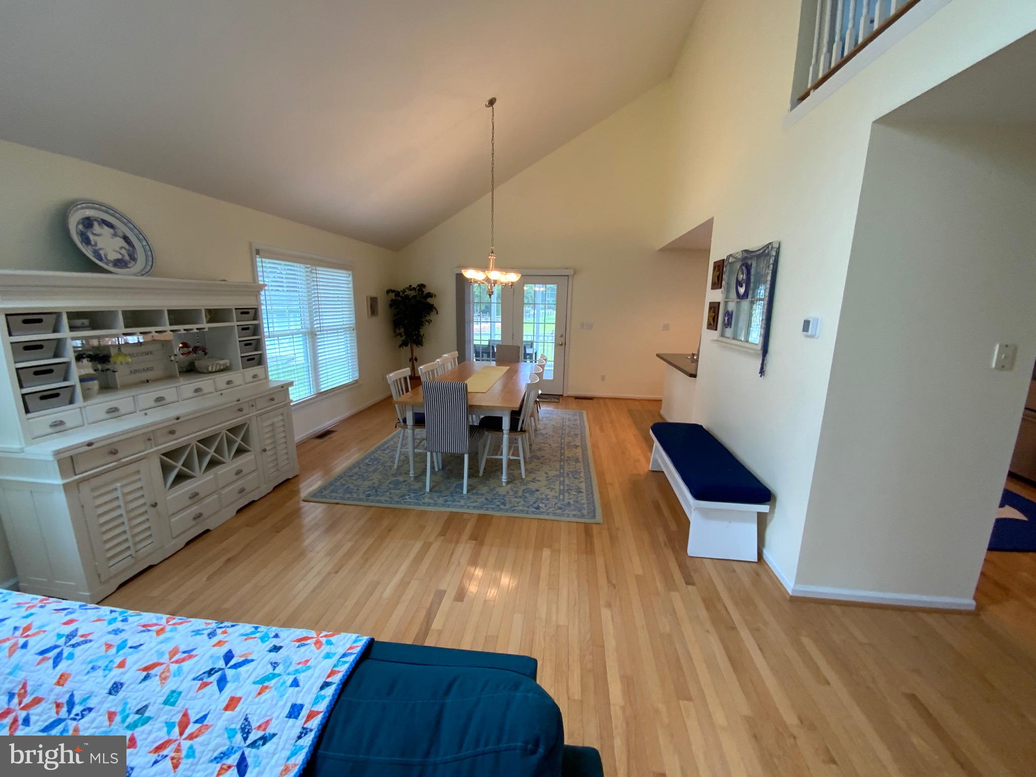 38211 Marlington Road Ocean View, DE 19970 - Photo 10 of 56 a living room with furniture and a wooden floor