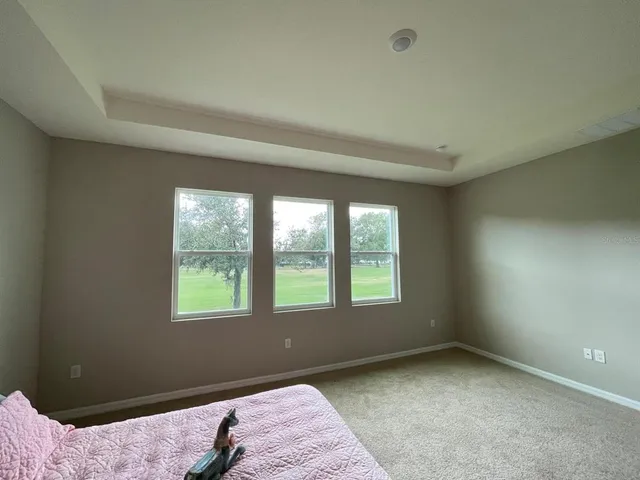 a bathroom with a tub and shower
