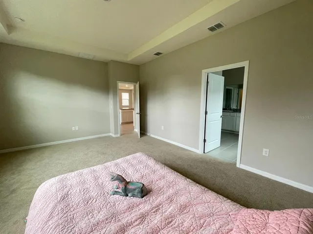 a bathroom with a tub sink and shower