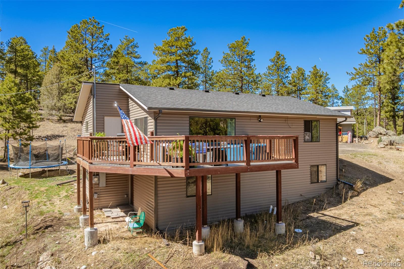752 Impala Trail Bailey, CO 80421 - Photo 1 of 50 a aerial view of a house with balcony