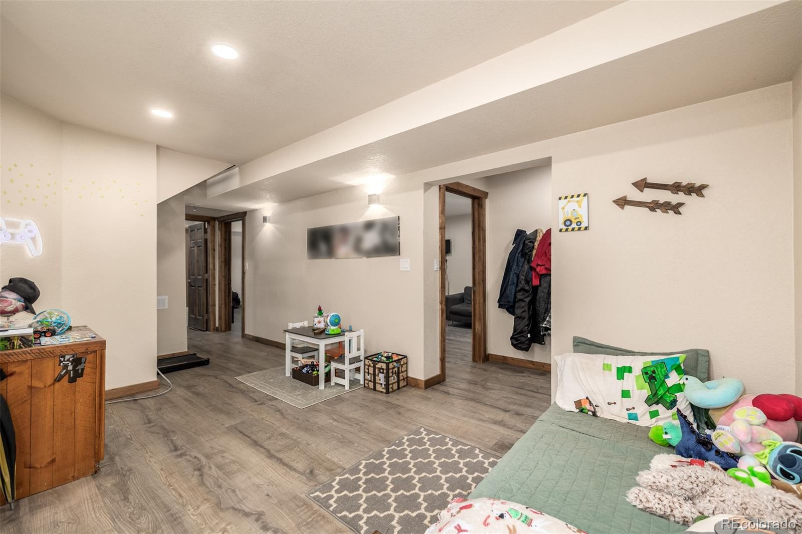 752 Impala Trail Bailey, CO 80421 - Photo 20 of 50 a living room with furniture and flowers