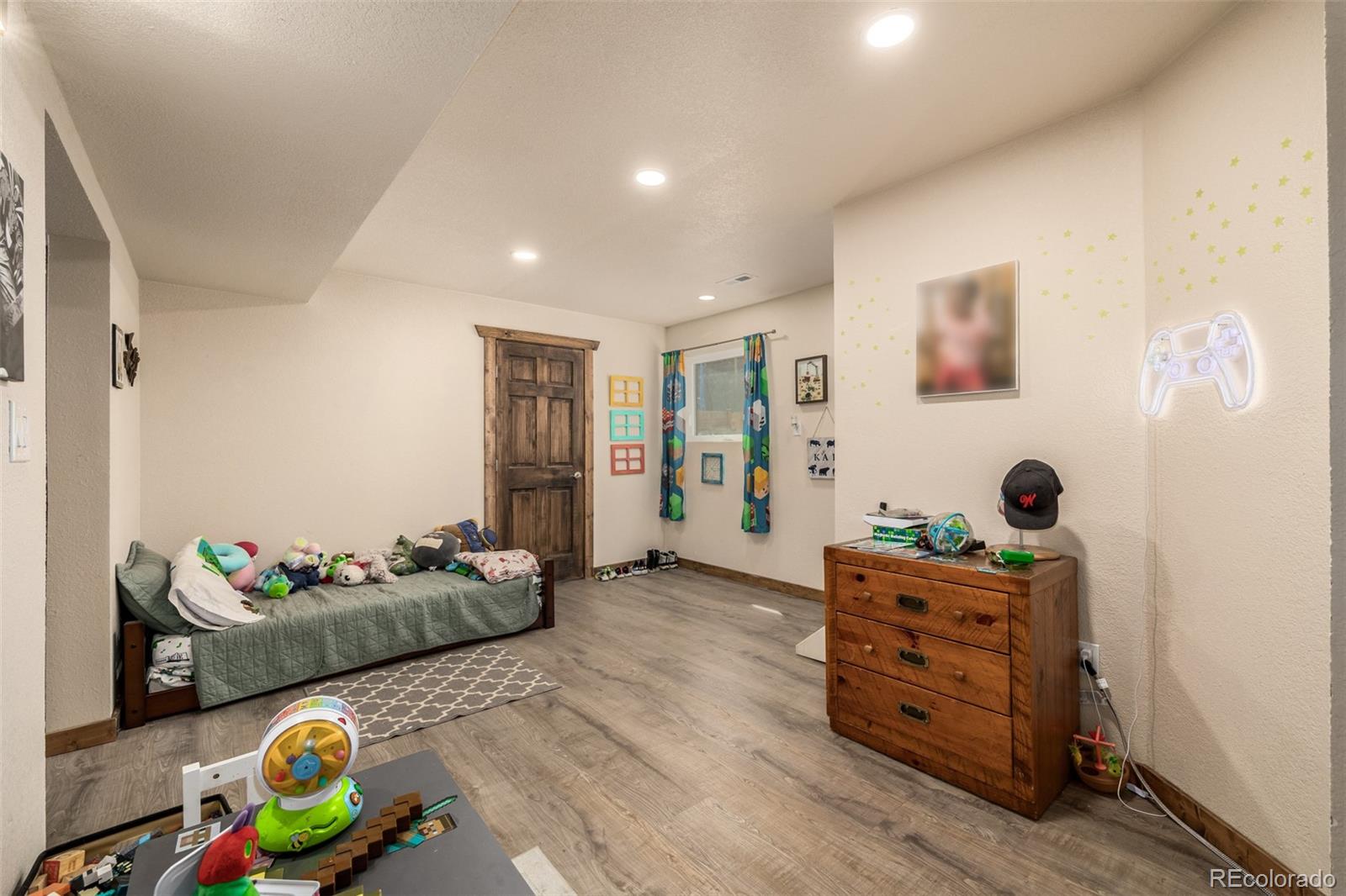 752 Impala Trail Bailey, CO 80421 - Photo 21 of 50 a living room with furniture and wooden floor