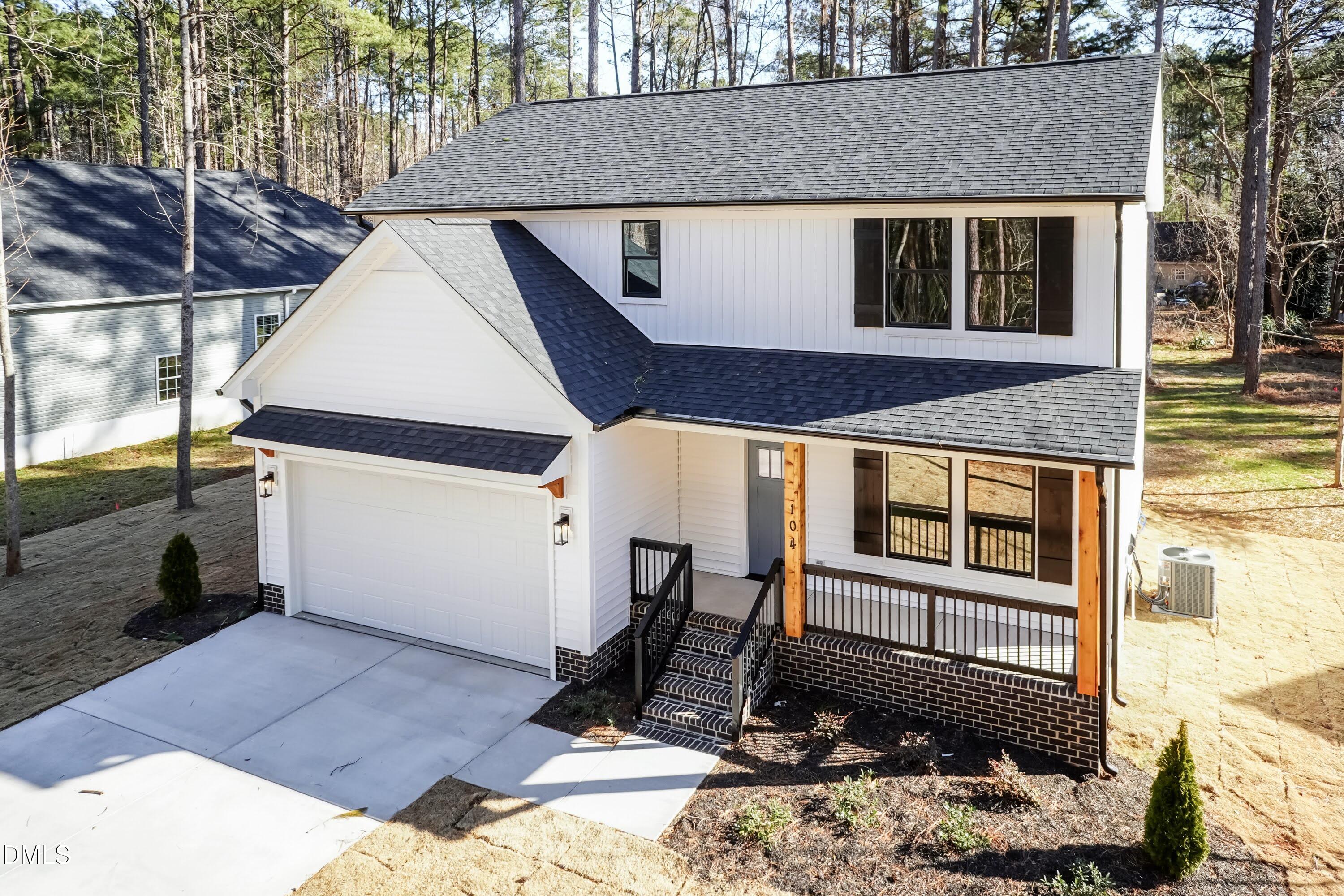 104 Buffalo Drive Spring Hope, NC 27882 - Photo 6 of 48 a front view of a house with a yard