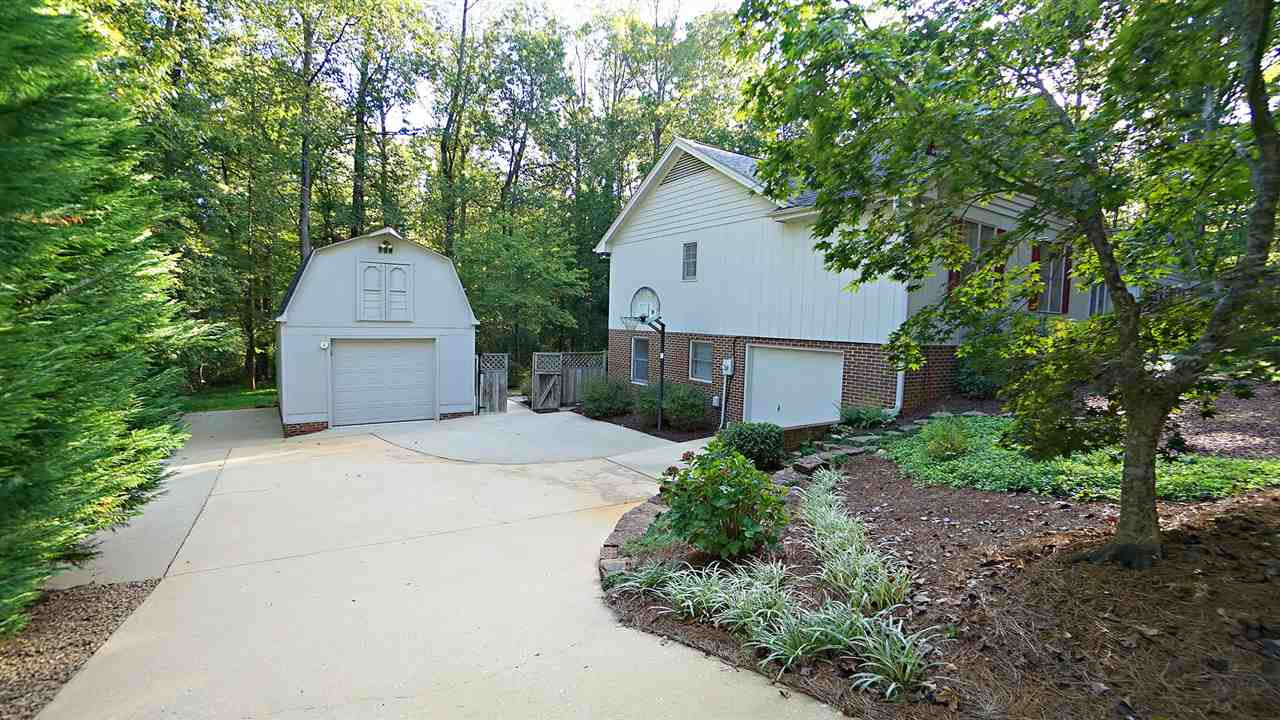 5113 Forest Creek Road Raleigh, NC 27606 - Photo 23 of 30 Private 3rd car garage w/ access to basement in-law suite. Exterior