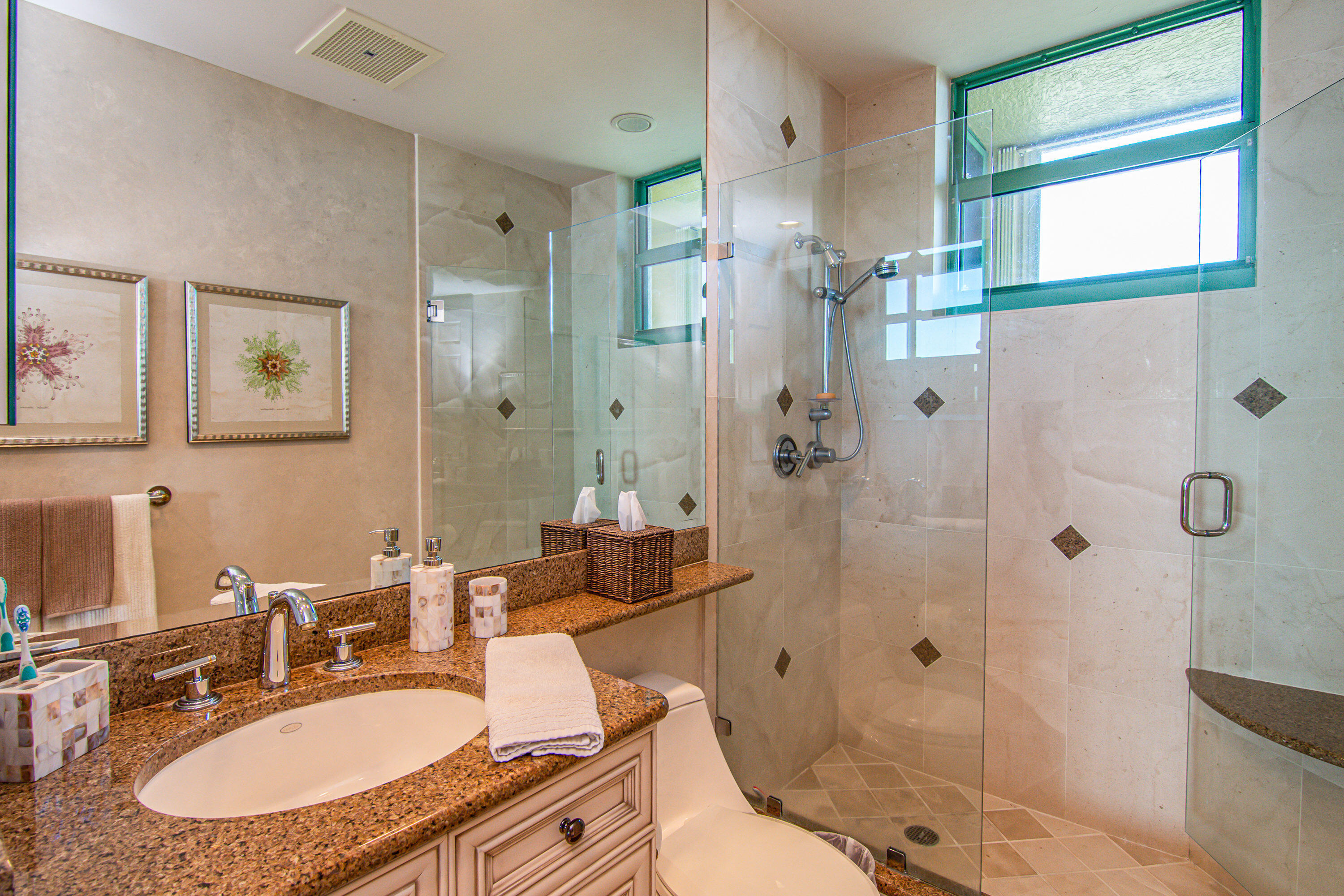 1069 Bald Eagle Drive, Unit S803 Marco Island, FL 34145 - Photo 18 of 41 a bathroom with a sink toilet and shower