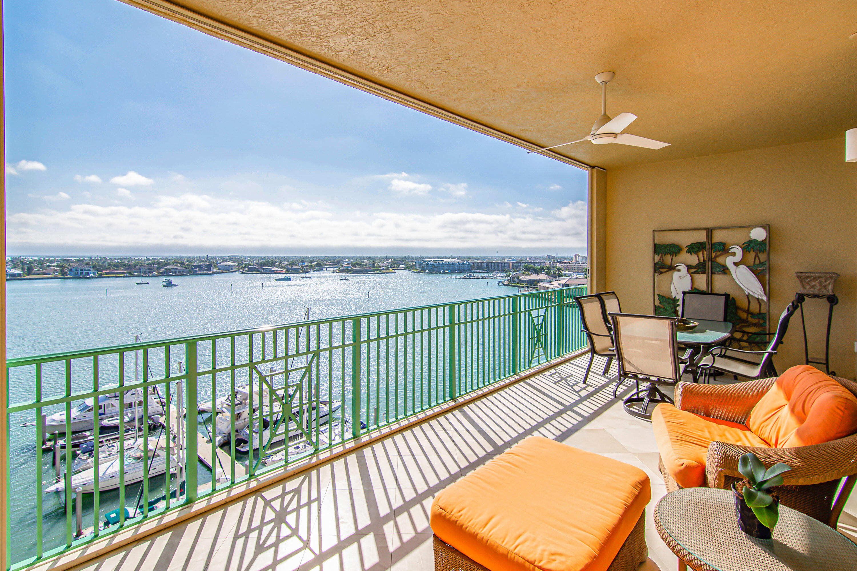 1069 Bald Eagle Drive, Unit S803 Marco Island, FL 34145 - Photo 19 of 41 a view of a balcony with chairs
