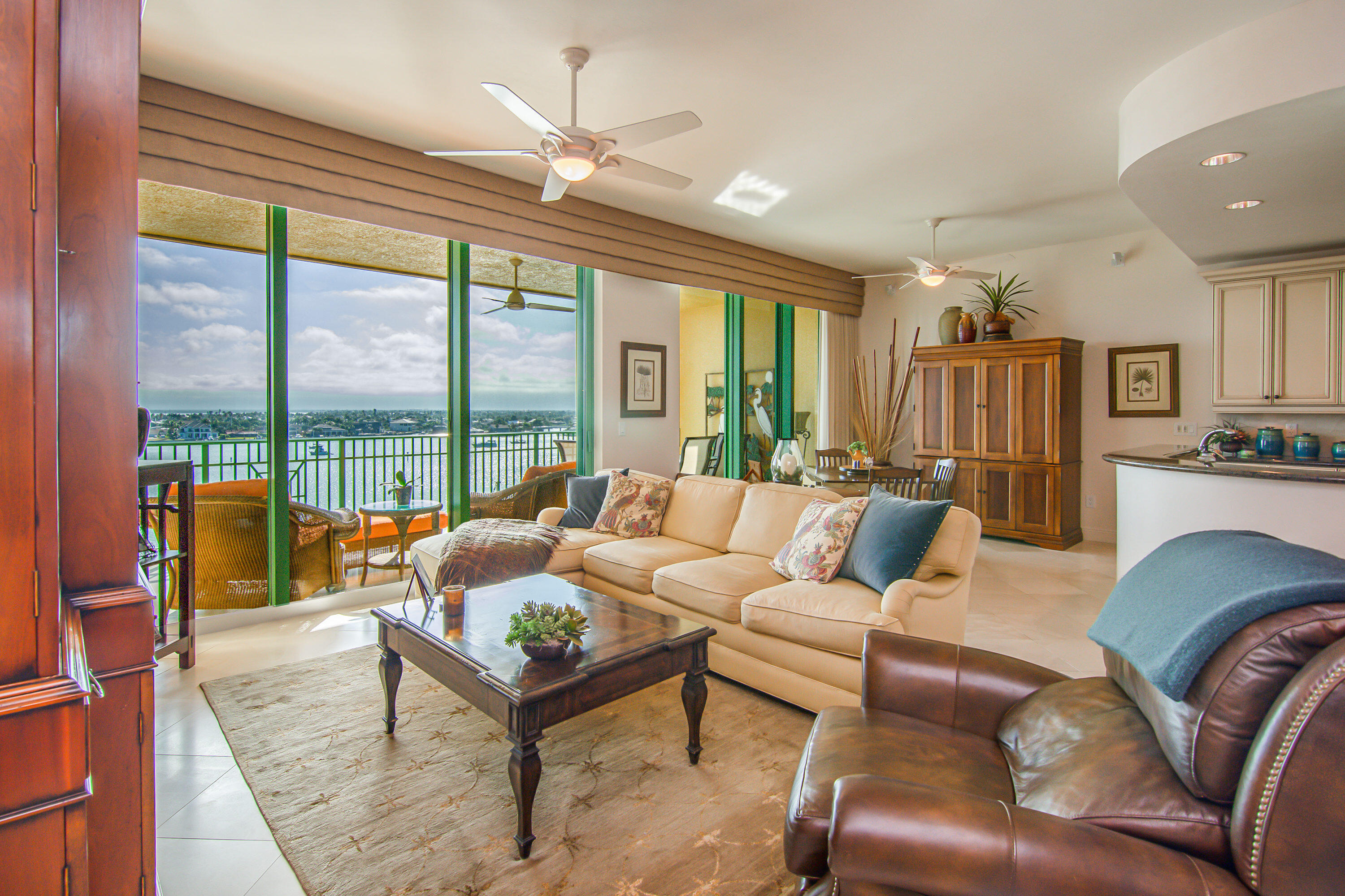 1069 Bald Eagle Drive, Unit S803 Marco Island, FL 34145 - Photo 4 of 41 a living room with furniture and a large window