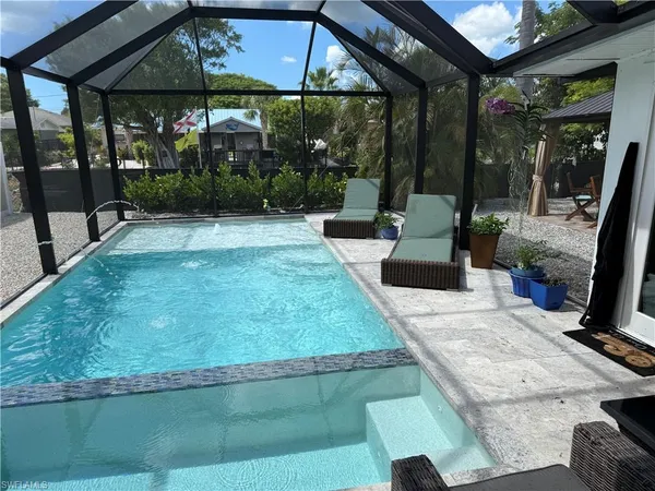a view of a couches in patio of a house