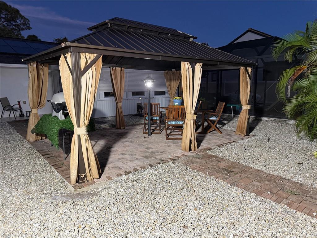 27044 Williams Road Bonita Springs, FL 34135 - Photo 12 of 27 a view of a house with porch and furniture