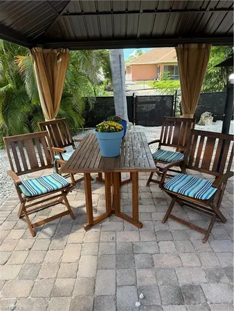 a outdoor living space with furniture and a patio