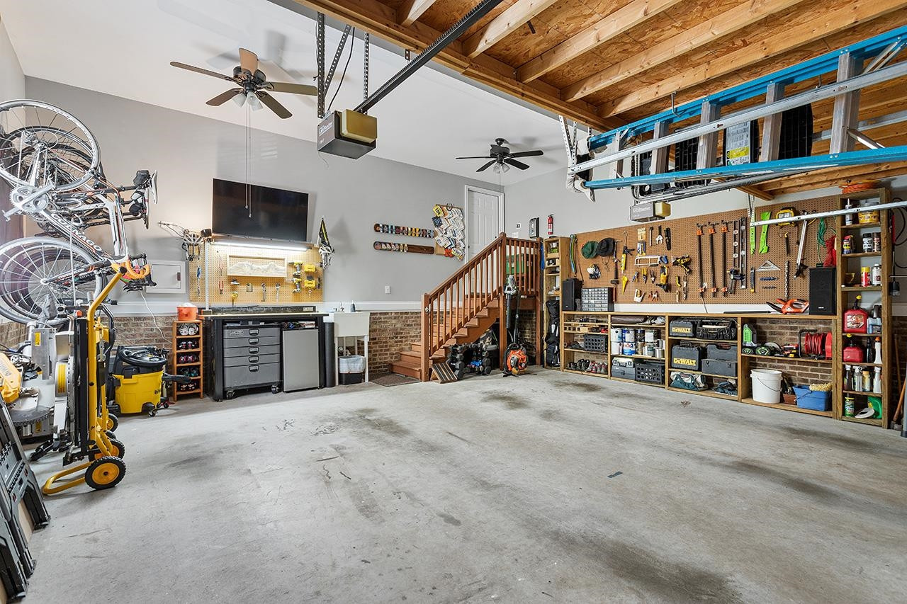 6408 Cedar Waters Drive Raleigh, NC 27607 - Photo 43 of 46 Garage With Shelves Overhead