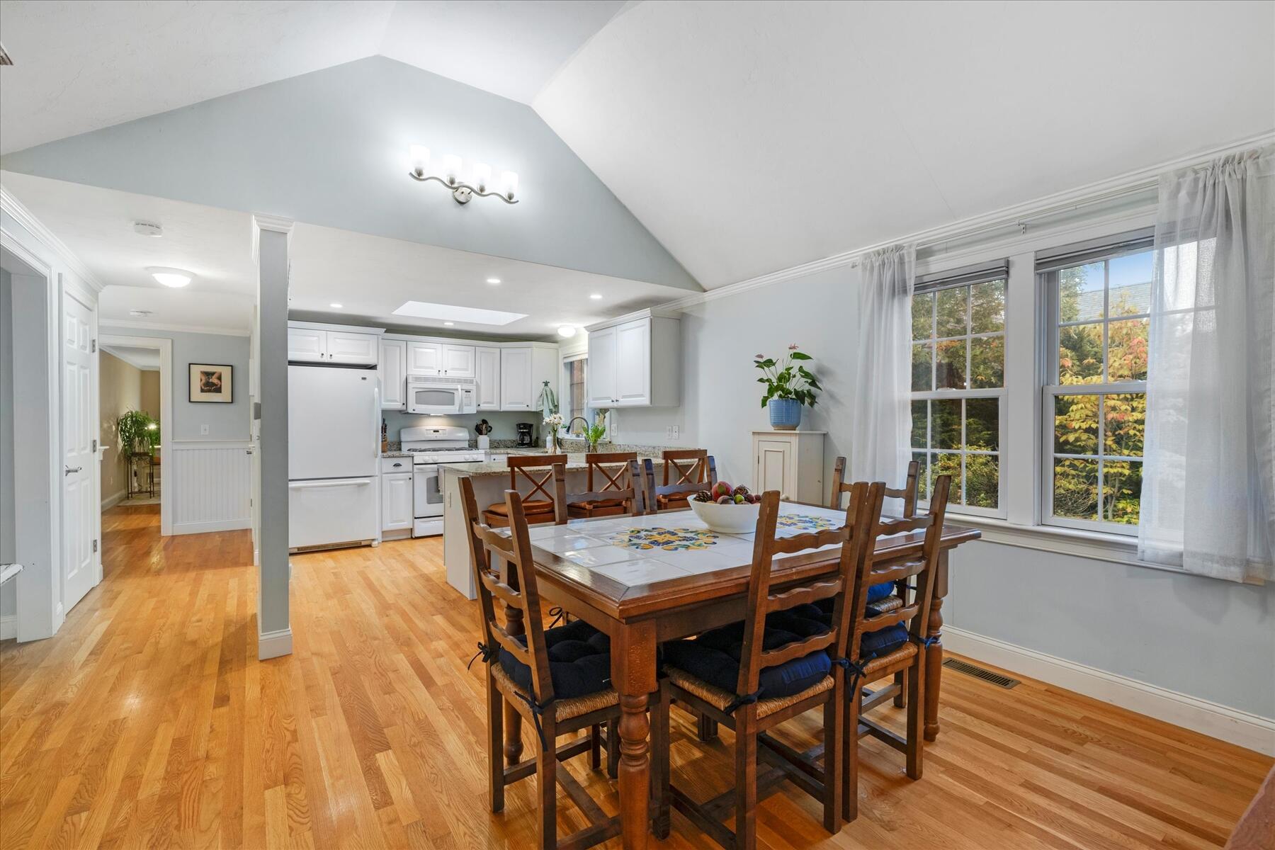 72 Dory Lane Eastham, MA 02642 - Photo 19 of 57 a view of a dining room with furniture and wooden floor