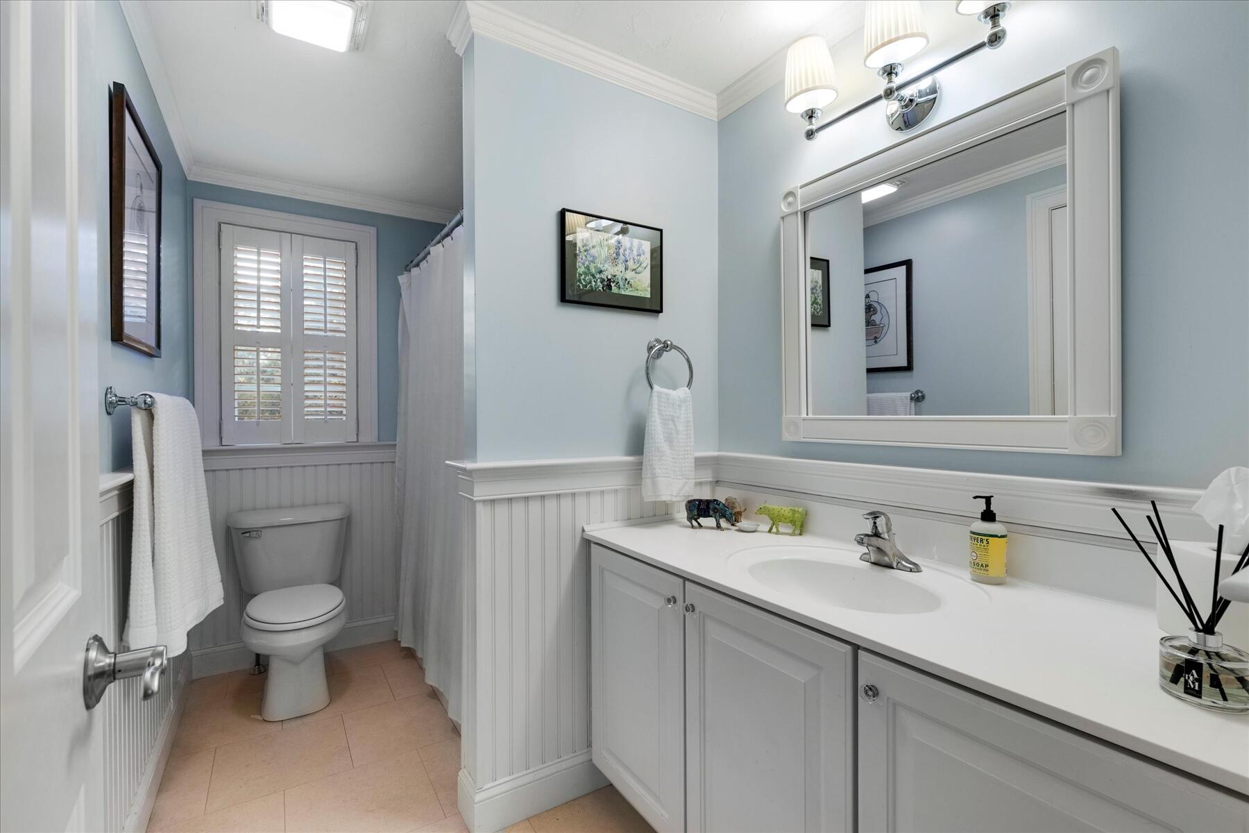 72 Dory Lane Eastham, MA 02642 - Photo 24 of 57 a bathroom with a sink toilet and mirror