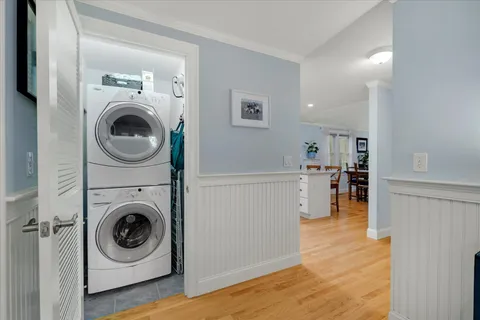 a bedroom with furniture and a book shelf
