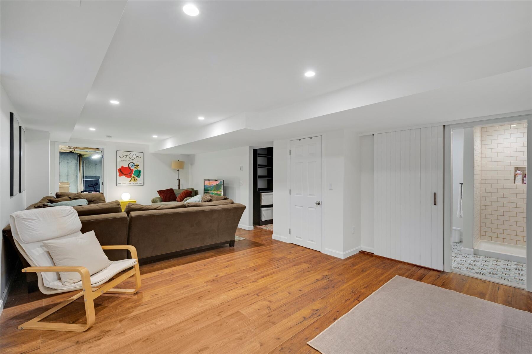 72 Dory Lane Eastham, MA 02642 - Photo 33 of 57 a living room with furniture and a wooden floor