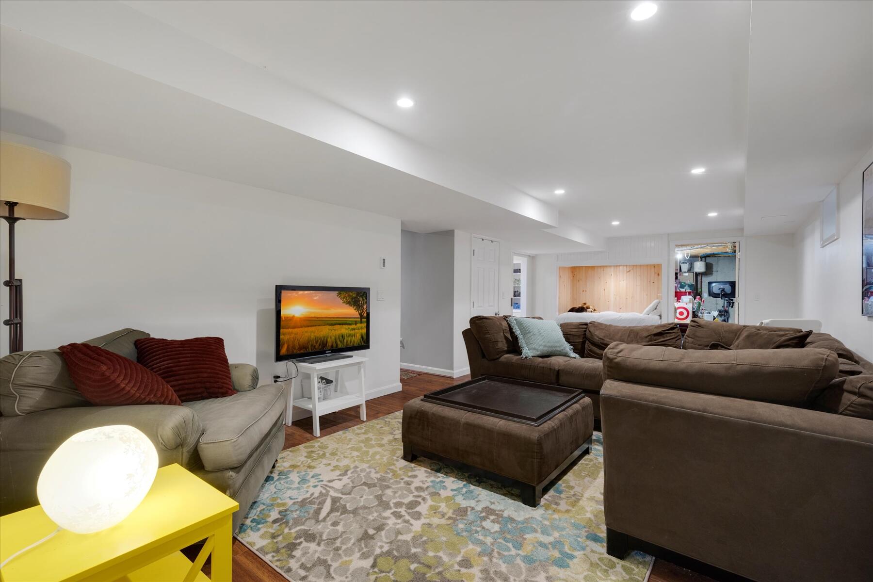 72 Dory Lane Eastham, MA 02642 - Photo 38 of 57 a living room with furniture and a flat screen tv