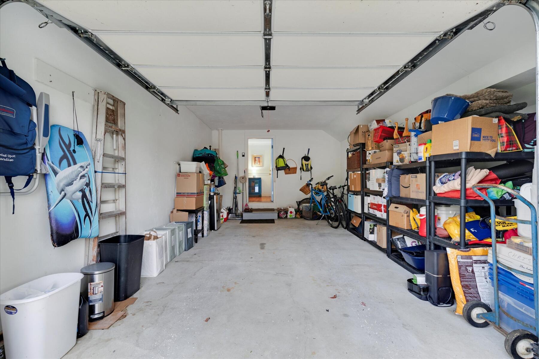 72 Dory Lane Eastham, MA 02642 - Photo 39 of 57 a living room with lots of furniture and clutter