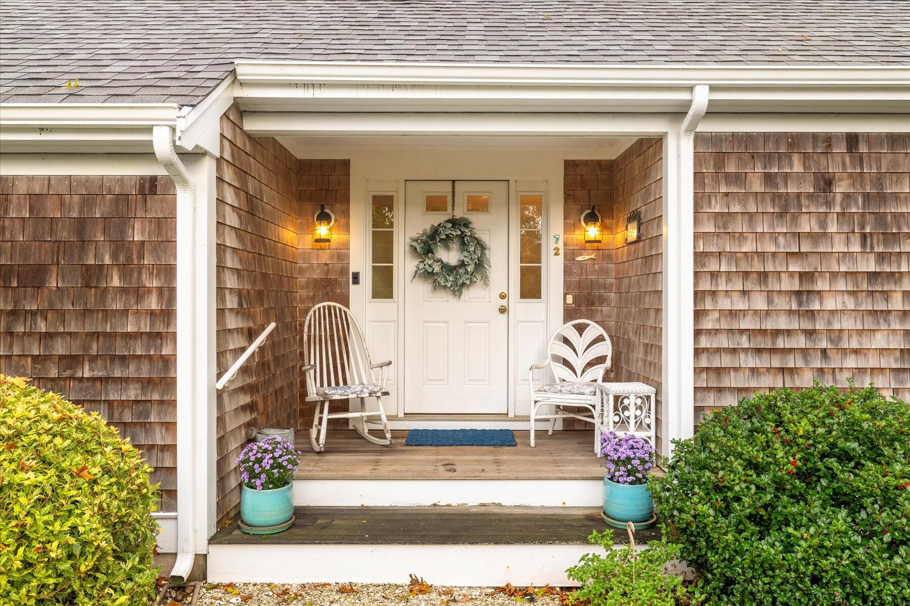 72 Dory Lane Eastham, MA 02642 - Photo 4 of 57 a front view of a house with outdoor space