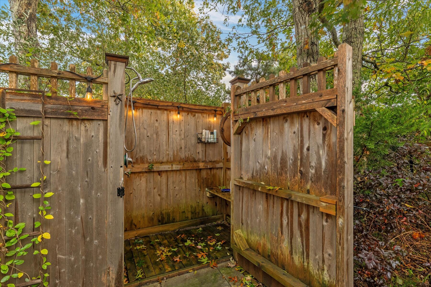 72 Dory Lane Eastham, MA 02642 - Photo 44 of 57 a view of a house with a wooden fence