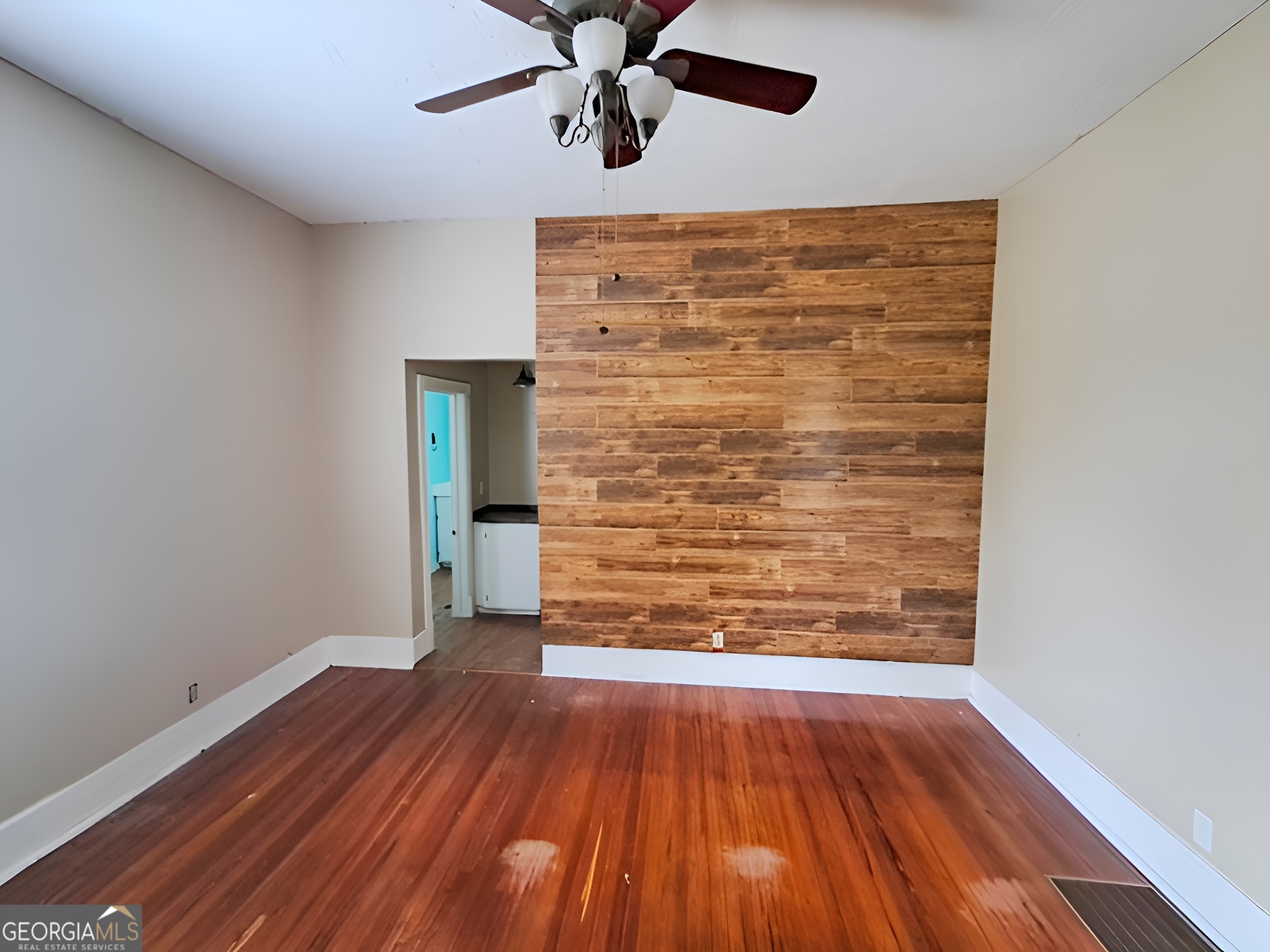 401 Forsyth Street Barnesville, GA 30204 - Photo 13 of 25 a view of empty room with wooden floor