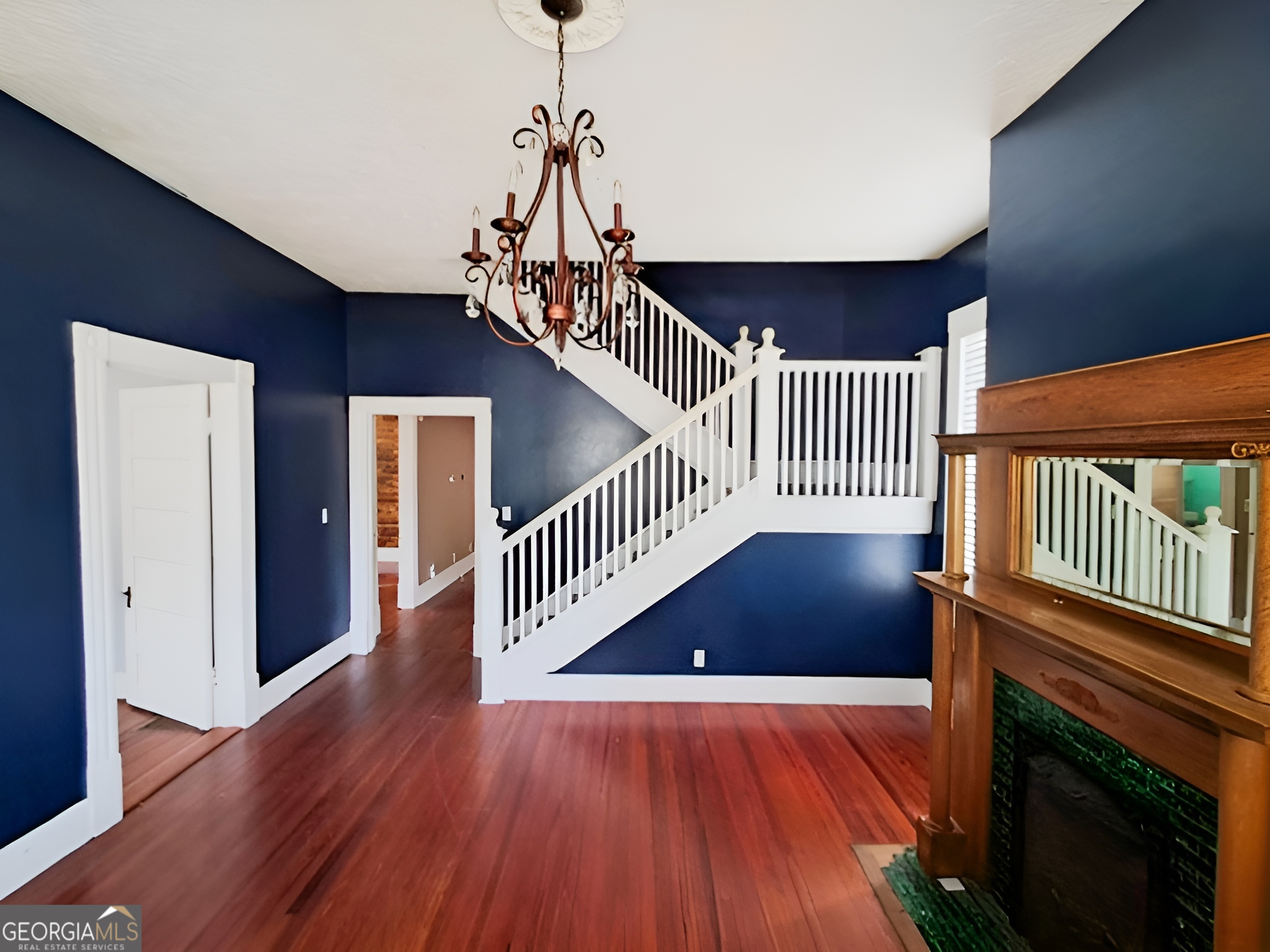 401 Forsyth Street Barnesville, GA 30204 - Photo 5 of 25 a view of entryway and hall with wooden floor