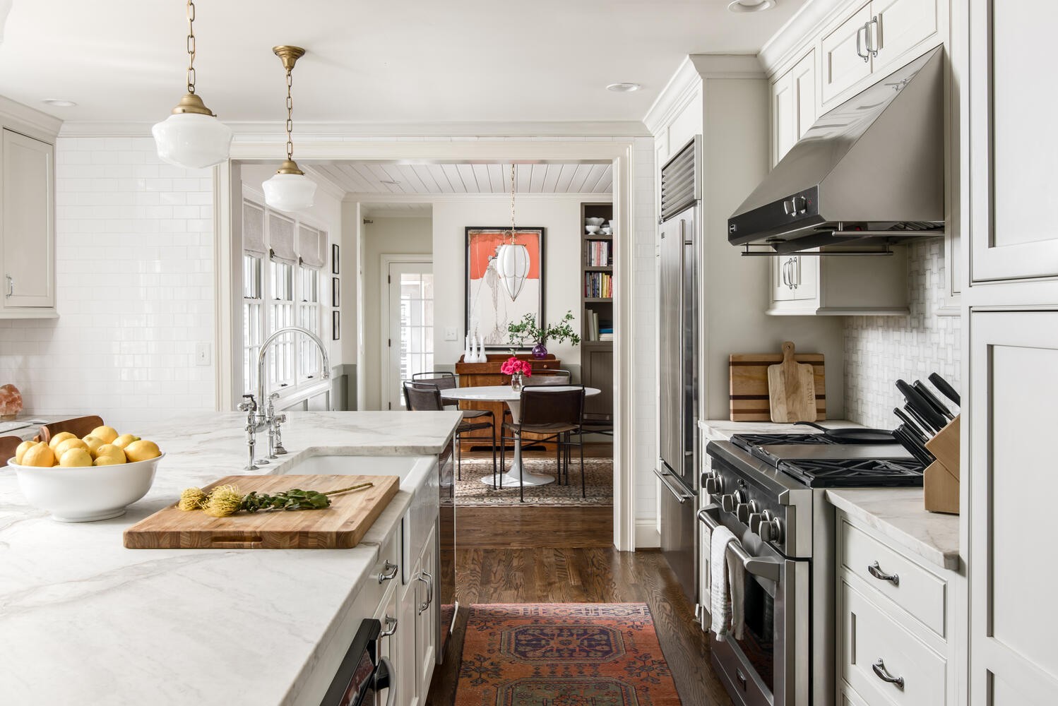 3904 Valley Road Nashville, TN 37205 - Photo 14 of 67 a kitchen with stainless steel appliances kitchen island granite countertop a stove a sink and a refrigerator